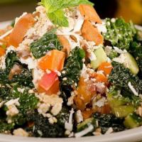 Caravan Kale Salad · Our local certified organically grown kale served with shaved ricotta, pita chips, Persian c...