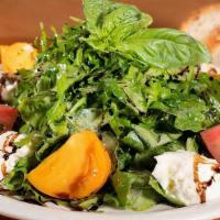 Heirloom Tomato & Burrata Salad (Seasonal) · Fresh Burrata cheese with heirloom tomatoes and baby arugula tossed in a Red Wine Vinaigrett...