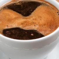 Rude Awakening · Our famous dark Manhattan Mudd™coffee with espresso poured on top!