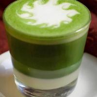 Green Tea Bebero · An organic green tea espresso layered with sweetened condensed milk.