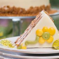 Carrot Cake Slice · Baked with golden raisins, fresh pineapple and walnuts and layered with our cream cheese fro...