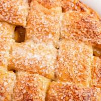 Granny Smith Apple Pie (Individual) · Our flakey, buttery pie crust loaded with granny smith apples, golden raisins, walnuts and s...