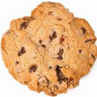 Chocolate Chunk Pecan · Our buttery version of the classic with semi sweet chocolate chunks and pecans.