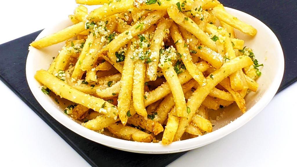 Garlic Parmesan Fries · Your traditional French Fries with an indulgent dose of fresh grated parmesan and garlic goodness.