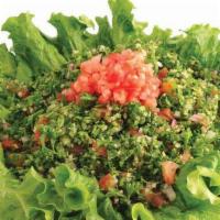 Tabouleh · Vegan. Cracked bulgur wheat, with freshly deiced parsley, tomatoes, onions, tossed with lemo...