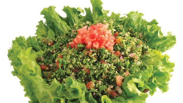 Tabouleh · Vegan. Cracked bulgur wheat, with freshly deiced parsley, tomatoes, onions, tossed with lemon juice and olive oil.
