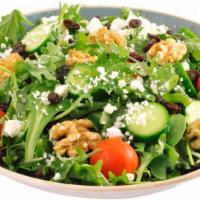 Mediterranean Kale Salad · Spring mix baby kale, feta cheese, cherry tomatoes, cucumber, raisins and walnut tossed in o...
