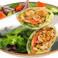 Chicken Döner Wrap · Slowly roasted rotisserie chicken marinated to perfection, wrapped with lettuce, tomatoes, a...