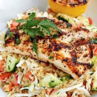 Grilled Mahi Mahi · grilled mahi mahi  •  quinoa • green cabbage • cucumbers • marinated artichokes • mixed oliv...