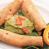 Taquitos · Crunchy rolled corn tortilla filled with your choice of shredded beef or chicken with lettuc...