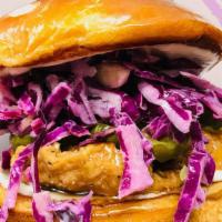 Lovely Original Sandwich · Crispy Chicken Breast, Purple Cabbage Slaw, Housemade Aioli, Butter Pickles on a Toasted Bri...