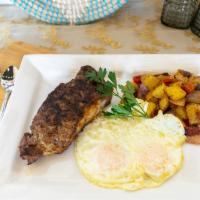 New York Steak & Eggs · Served with two eggs any style and choice of hash browns or chef's breakfast potatoes and ch...