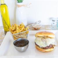 The French Dip Burger · Beef patty, grilled onions and choice of cheese: cheddar, swiss, American, or jack. Served w...