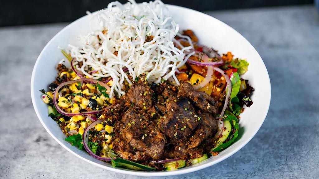 Sweet Pepper & Steak Salad · A new special available for a limited time. Made with grilled steak, mixed greens, sliced cucumber, corn salsa, grilled sweet peppers, sliced red onion, crispy rice noodles, wasabi quinoa furikake, yuzu miso dressing.