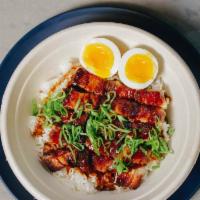 Adobo Bowl  · Braised pork belly, adobo sauce, soft boiled egg, scallions, and rice.