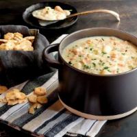 New England Clam Chowder · Thick and creamy with premium clams, potatoes, onion and celery