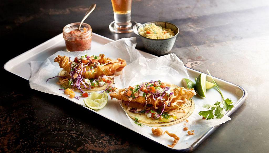 Fish Tacos · Grilled or fried white fish, chipotle sauce, fresh pico de gallo, cheese, corn tortillas and homemade salsa