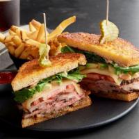 Cali Tri-Tip Sandwich · Slow-roasted tr-tip, provolone cheese, avocado, tomatoes, lettuce, Thousand Island dressing ...