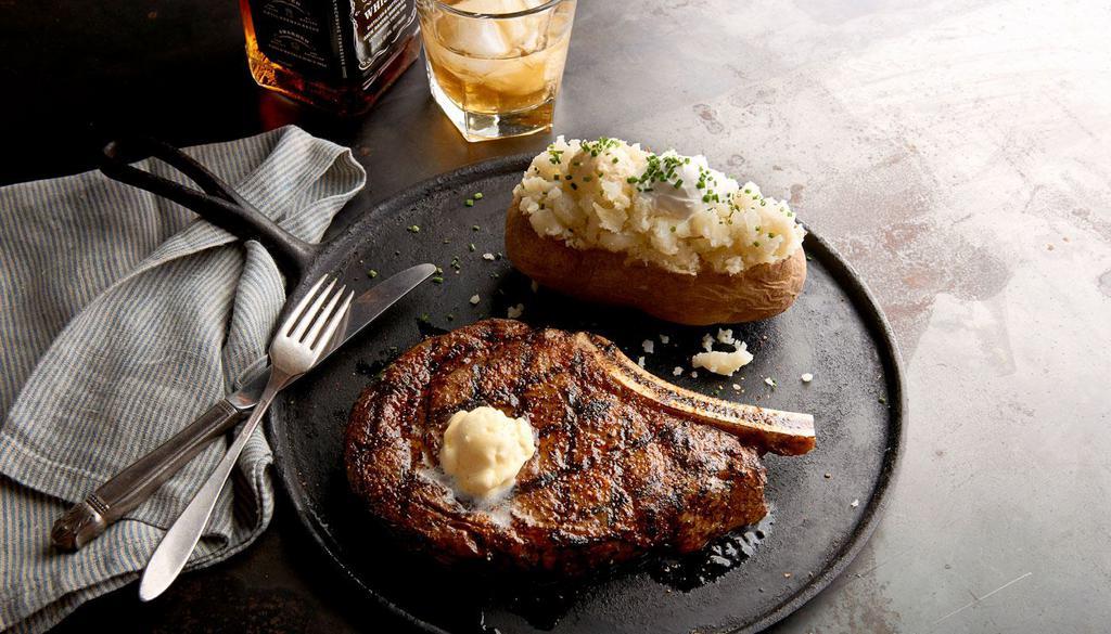 Ribeye Steak (Gs) · Gluten sensitive. 12oz. Hand-cut boneless USDA choice. Served with choice of 2 sides.