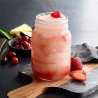 Pineapple Lava Flow · Pineapple juice and coconut puree blended together then poured over strawberry puree.