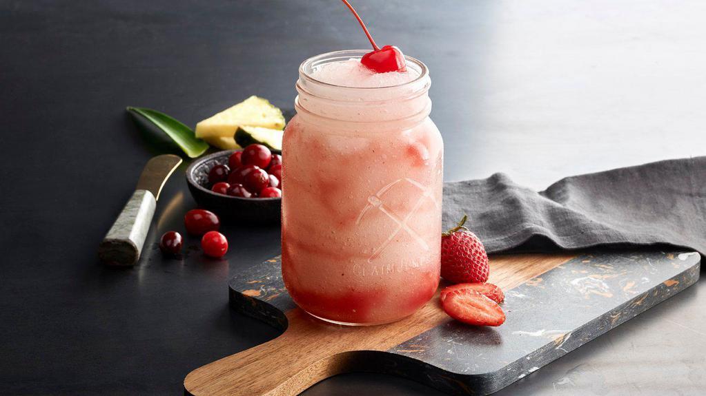 Pineapple Coconut Lava Flow · Pineapple juice and coconut puree blended together then poured over strawberry puree.