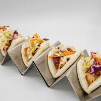 Chicka Bao Wow · 5 mini bao buns with nashville chicken, coleslaw, and comeback sauce