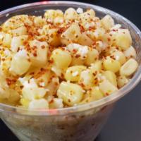 Mexican Corn · Mayo, cheese, and chile powder.