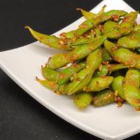 Spicy Garlic Edamame · steam cooked soybean with butter, garlic and spicy paste.