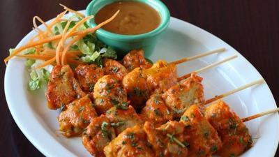 Chicken Satay · Grilled marinated soy chicken and cucumber salad served with peanut sauce.