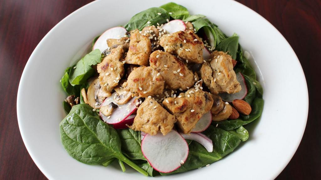 Spinach Salad · Spinach, soy chicken, onion, almonds, mushroom, radishes, sesame seeds mixed with sesame dressing.