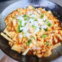 Curry Fries · thin & crispy fries, cheese, curry tofu sauce, white onion, green onion