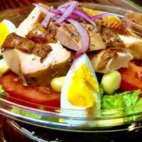Chicken Over Salad · Includes lettuce, cucumber salad, hummus, pickles, pita and white sauce and hot sauce.