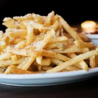 Greek Fries · Shoestring fries tossed with fresh garlic, oregano, olive oil, grated parmesan and fresh squ...