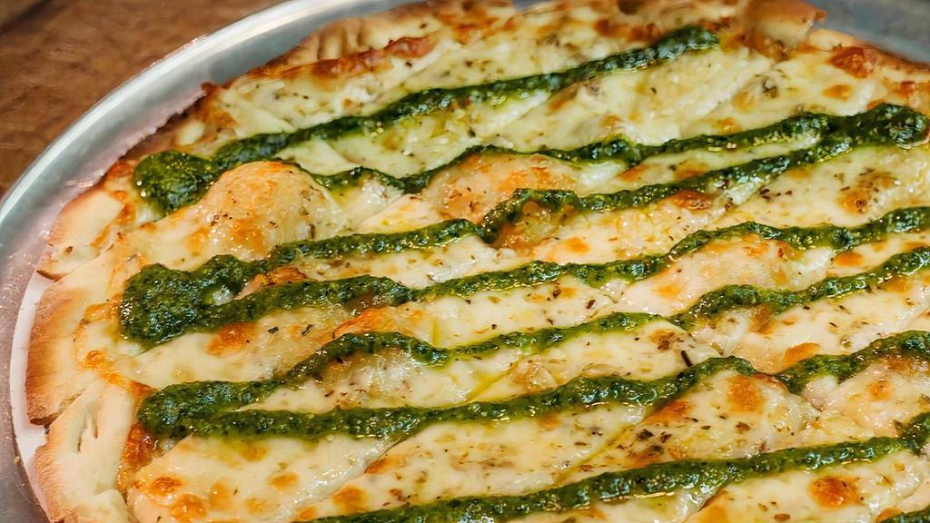 Pesto Strips · Thin pizza crust topped with olive oil, garlic, mozzarella and pesto.