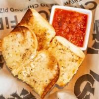 Garlic Bread, Small · Our French baguette, with garlic butter, olive oil and Wisconsin mozzarella. Serves 2-3