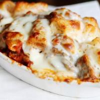 Spicy Baked Rigatoni - Individual · Baked Rigatoni with Spicy sausage and marinara and béchamel sauce. Served with focaccia bread.