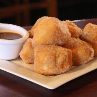 Big Easy Beignets · New Orleans style dough, deep fried and coated in your choice of powdered sugar or cinnamon ...