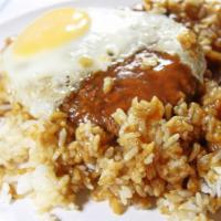 Loco Moco · Two marinated beef patties, topped with our special brown gravy and a fried egg.
