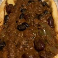 The Vdog Caliente · Spicy beyond sausage, mustard, onions, relish.