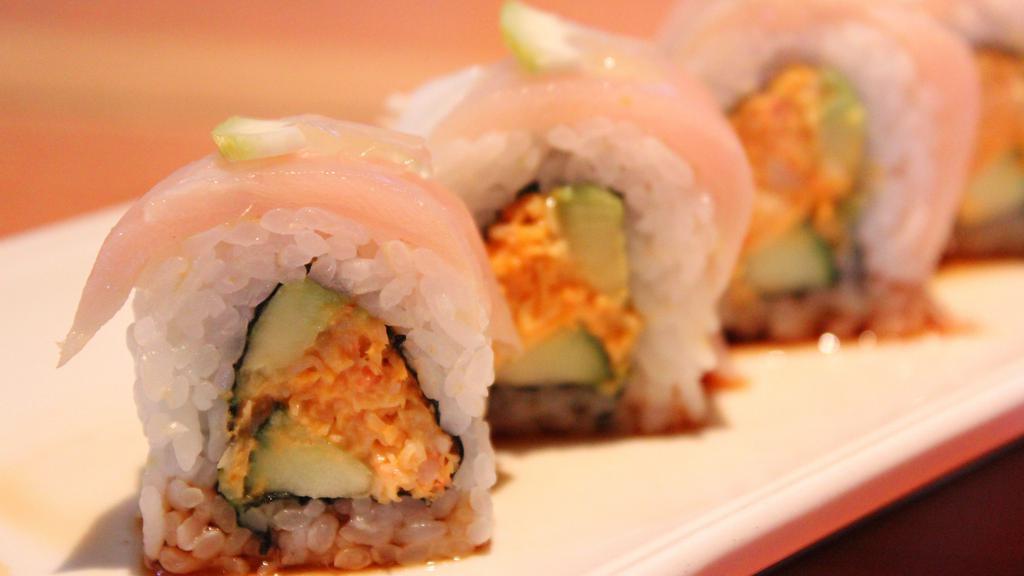 Lemon Albacore Roll · Gluten-free, spicy. Spicy crab, cucumber, avocado topped with albacore, lemon and ponzu sauce.