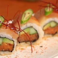 Celebration Roll · Gluten-free. Spicy tuna, cucumber, avocado topped with albacore, serrano, shredded dried red...
