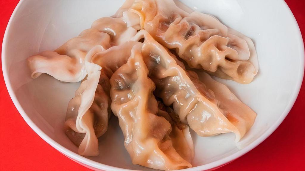 5 Pack Dumplings · Steamed with your choice of filling between Ginger Chicken and Green Vegetable.