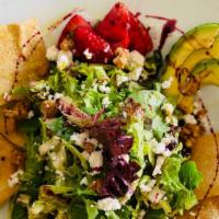 California Salad (V) · Mixed greens, avocado, strawberries, French feta cheese, caramelized walnuts in a home made ...