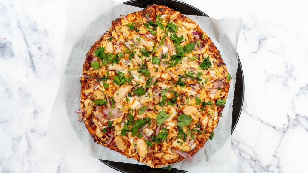 Bbq Chicken · Seasoned grilled sliced chicken breast, smoked gouda and mozzarella Cheese, red onions and cilantro with bbq sauce.
