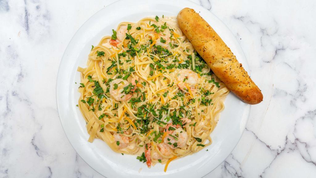 Shrimp Pasta · Seasoned grilled shrimp in a creamy alfredo sauce and your choice of spaghetti or fettuccine.
