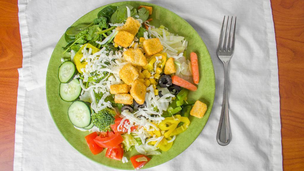 Large Size Salad · Garden salad full of veggies. 
Comes with a side of dressing your choice (ranch, thousand island, balsamic vinaigrette, blue cheese, or Italian dressing)