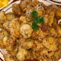 Box O' Gizzards · Hand breaded tender gizzards with 2 individual sides and 1 roll with honey.