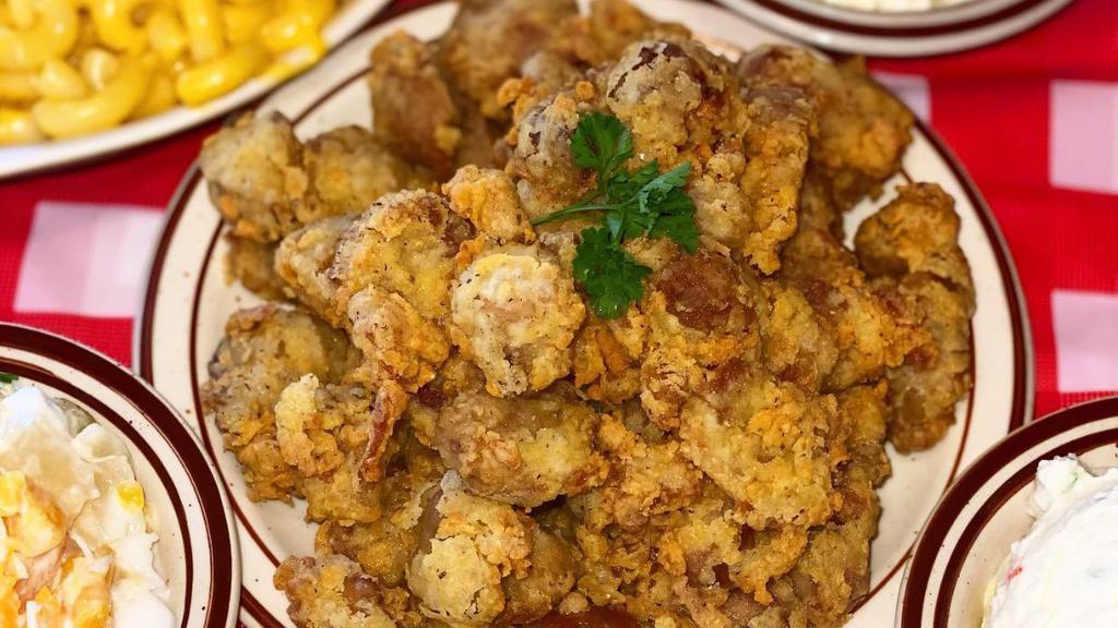 Box O' Gizzards · Hand breaded tender gizzards with 2 individual sides and 1 roll with honey.