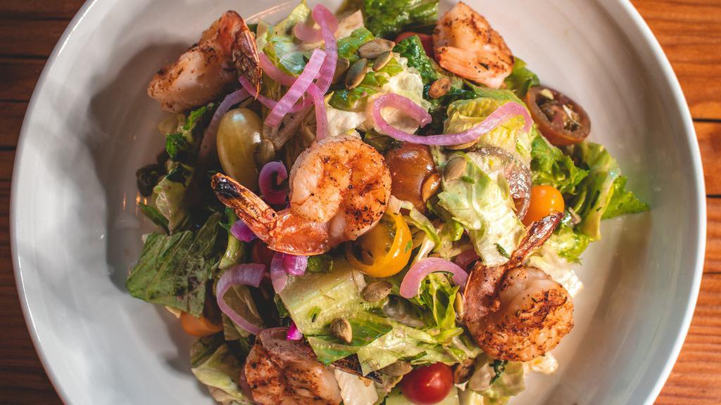 Blackened Shrimp Salad · Romaine and spring mix greens, avocado, pickled red onion, heirloom cherry tomatoes, toasted pepitas, fresh cilantro and honey chipotle viniagrette