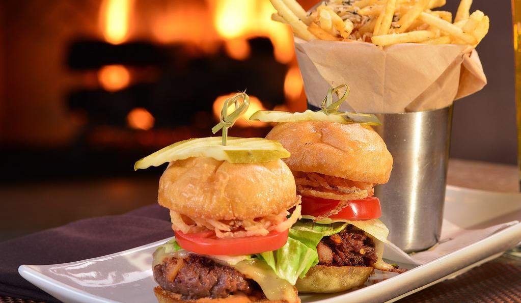 50/1/50 Sliders · Two sliders with American Kobe beef, bacon and habanero peppers with crispy onion strings, habanero jack cheese, lettuce, tomato, pickles and thousand island with with rosemary parmesan frites or side salad